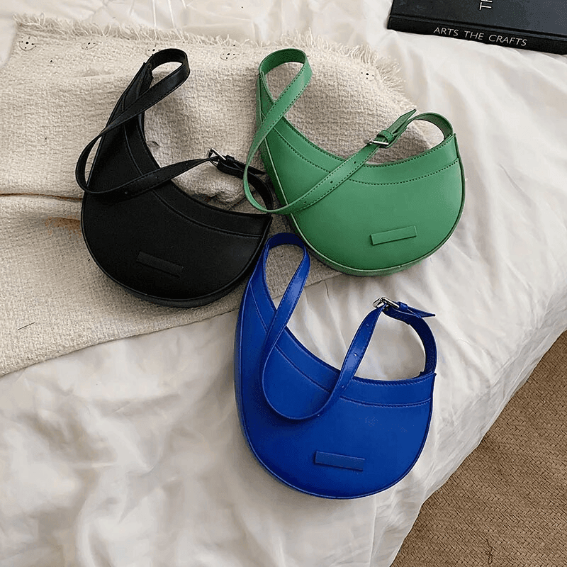 תיק של מעצב מספרד בגיזרה נשית פרקטית לנשיאה של חפצים אישיים ללוק טרנדי - לה איסלה