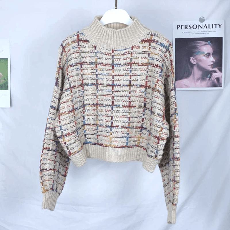 סריג נשי קצר של מעצב בלגי בגיזרה נשית מחמיאה ובצבעוניות פסים רכה ללוק מרהיב - לה איסלה