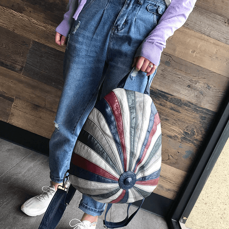 תיק גב מושלם בסיגנון כובע להופעה בולטת ולנשיאה של חפצים בחלוקה פרקטית נבונה - לה איסלה