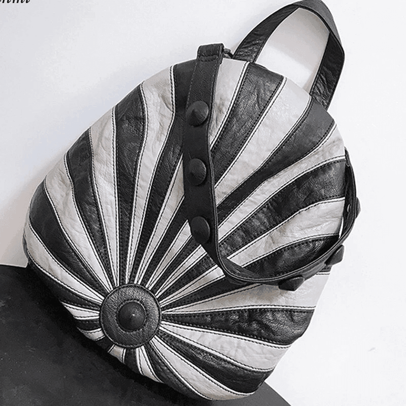 תיק גב מושלם בסיגנון כובע להופעה בולטת ולנשיאה של חפצים בחלוקה פרקטית נבונה - לה איסלה