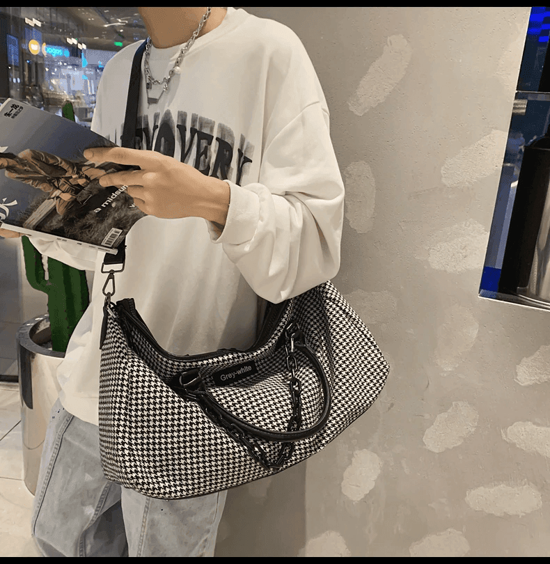 תיק נסיעות גדול של מעצב ניו יורקי בגיזרה גדולה ומכילה להופעה אופנתית מגניבה - לה איסלה