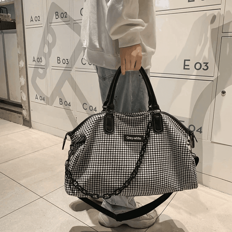 תיק נסיעות גדול של מעצב ניו יורקי בגיזרה גדולה ומכילה להופעה אופנתית מגניבה - לה איסלה