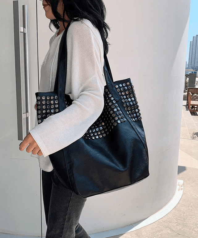 תיק שק ממילאנו בשילוב ניטים מהממים למראה מעצים - לה איסלה