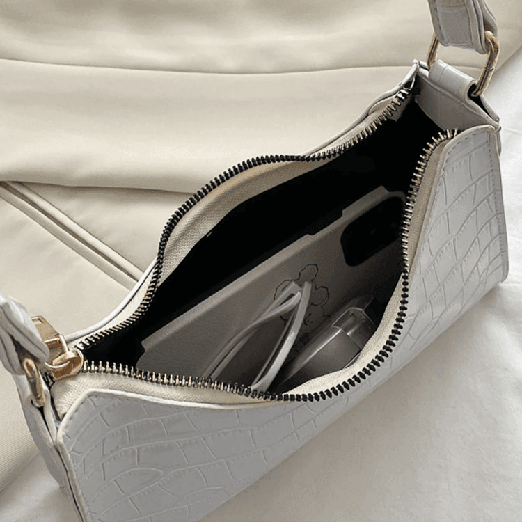 תיק אישי ממילאנו ליציאות ולבילויים בגימור מנוחש בסיגנון לקה להופעה נשית מדוייקת - לה איסלה