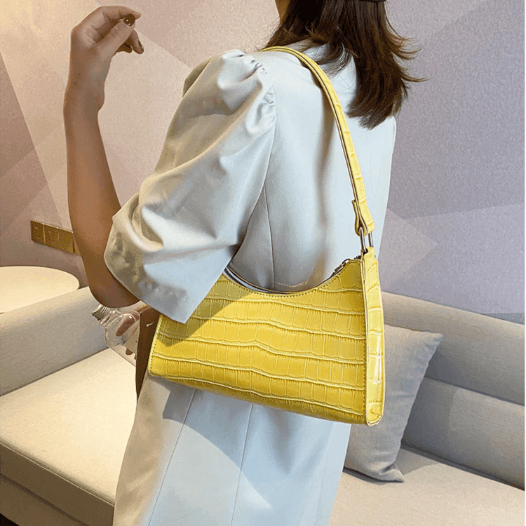 תיק אישי ממילאנו ליציאות ולבילויים בגימור מנוחש בסיגנון לקה להופעה נשית מדוייקת - לה איסלה