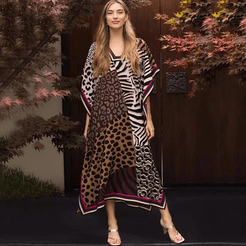 שמלת גלביה שמתאימה גם לחוף וגם לערב בגיזרה רחבה ומתנפנפת ללוק היסטרי לעונה - לה איסלה