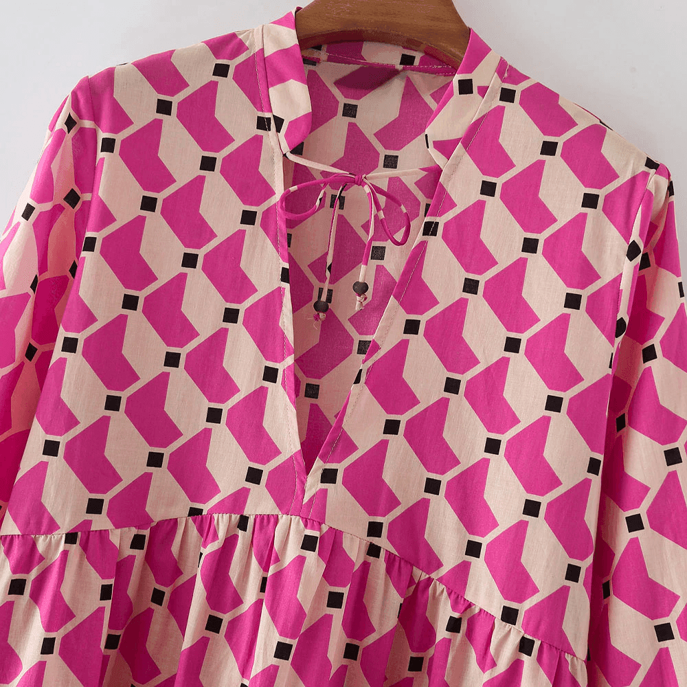 שמלת פשתן בגיזרה רחבה לקיץ להופעה בסיגנון אתני מרהיב וללוק של אישה אופנתית - לה איסלה