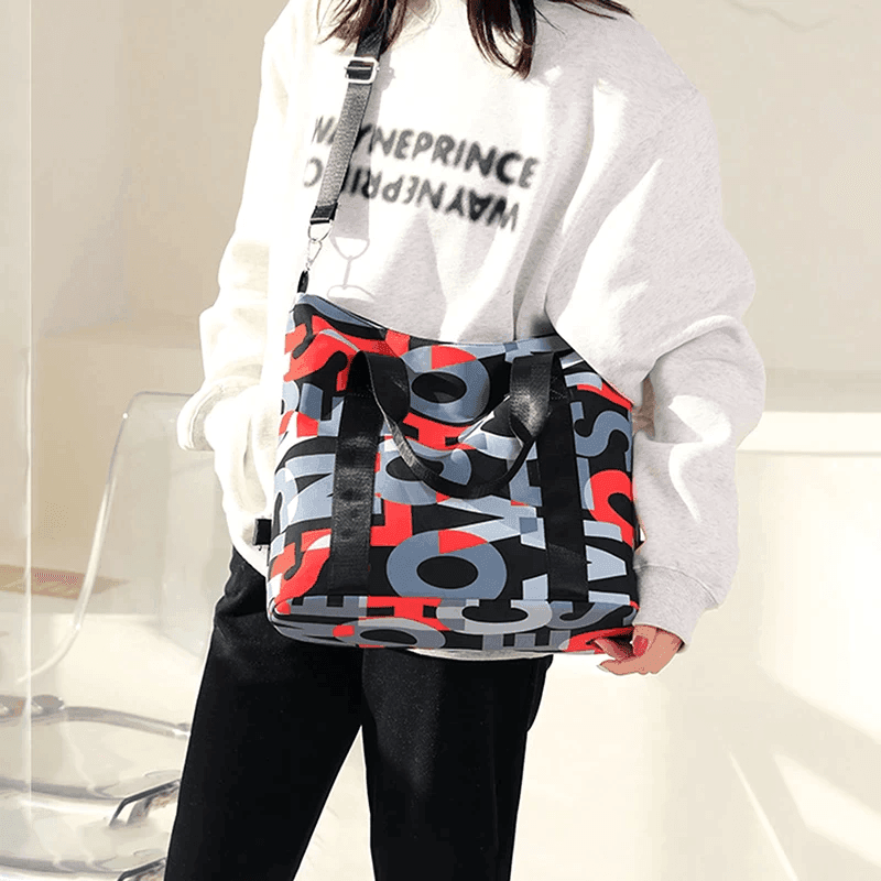 תיק מושלם ליום יום של מעצב אמריקאי בגימור אותיות צבעוני ללוק נשי אופנתי - לה איסלה