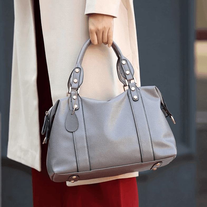 תיק צד לנשיאה גם ביד בחלוקה רבה ולא מתחכמת של תאים ללוק נשי עוצמתי - לה איסלה