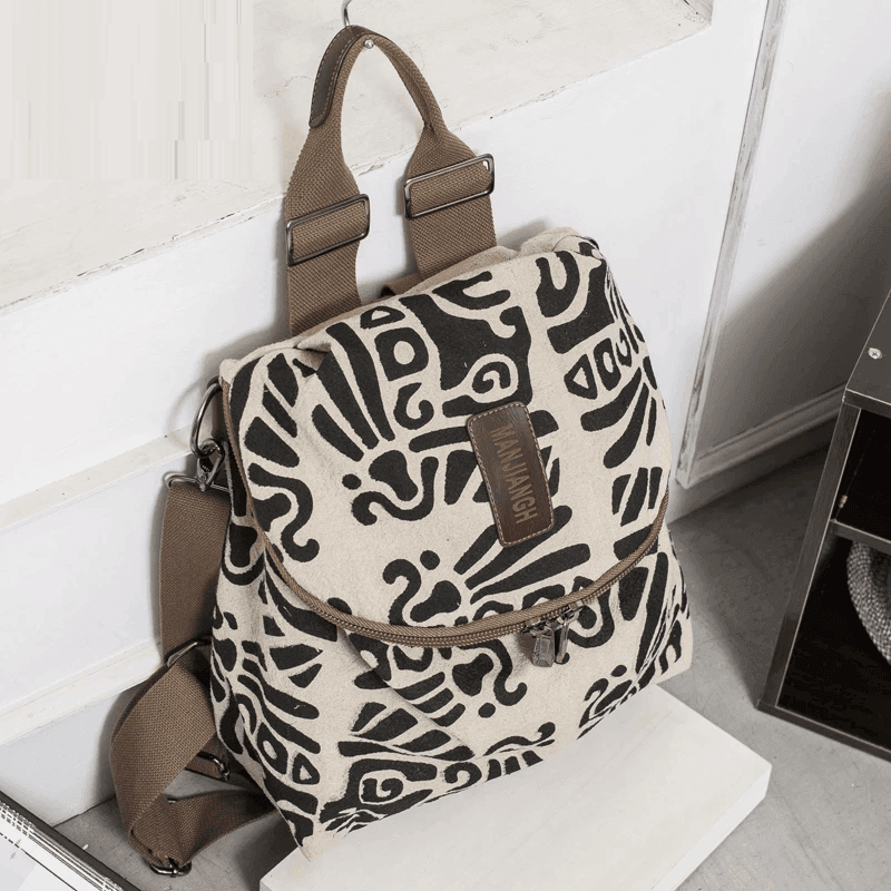 תיק קז'ואל מושלם בגימור אופנתי בצבעי חאקי בגיזרה נשית מכילה ובחלוקה רבה של תאים - לה איסלה