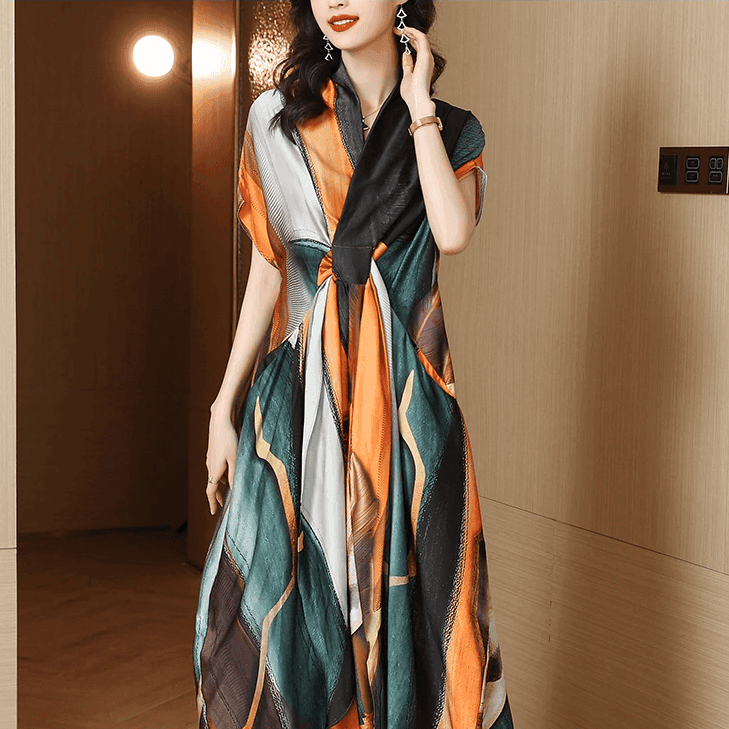 שמלת מעצב בגיזרה אסימטרית של מעצב בגימור כיסים משגע ובצבעוניות מרהיבה - לה איסלה