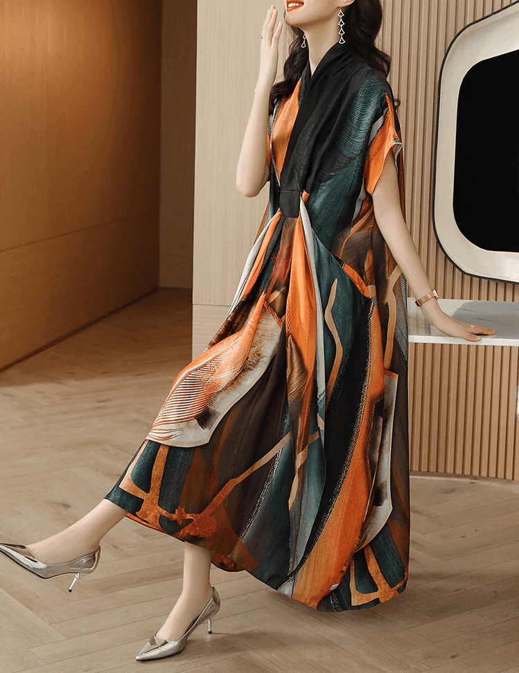 שמלת מעצב בגיזרה אסימטרית של מעצב בגימור כיסים משגע ובצבעוניות מרהיבה - לה איסלה