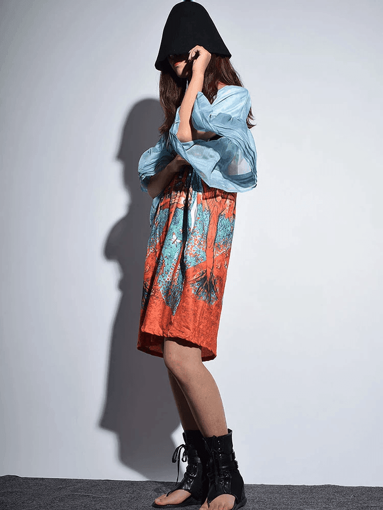 שמלת טוניקה מושלמת בהדפס קייצי ובגימור של כתפיים בגיזרת מלמלה ללוק נשי ייחודי - לה איסלה