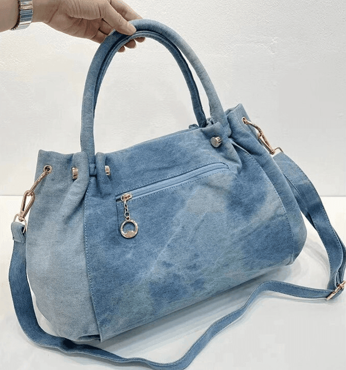 תיק ג'ינס מושלם בשילוב זרקונים בצורת כנפי מלאף להופעה נשית אופנתית חכמה - לה איסלה