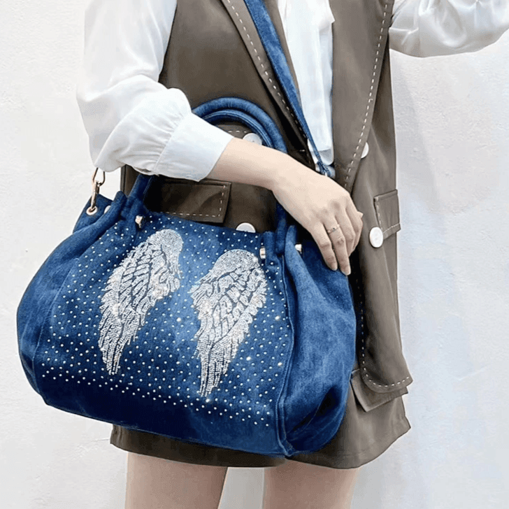 תיק ג'ינס מושלם בשילוב זרקונים בצורת כנפי מלאף להופעה נשית אופנתית חכמה - לה איסלה