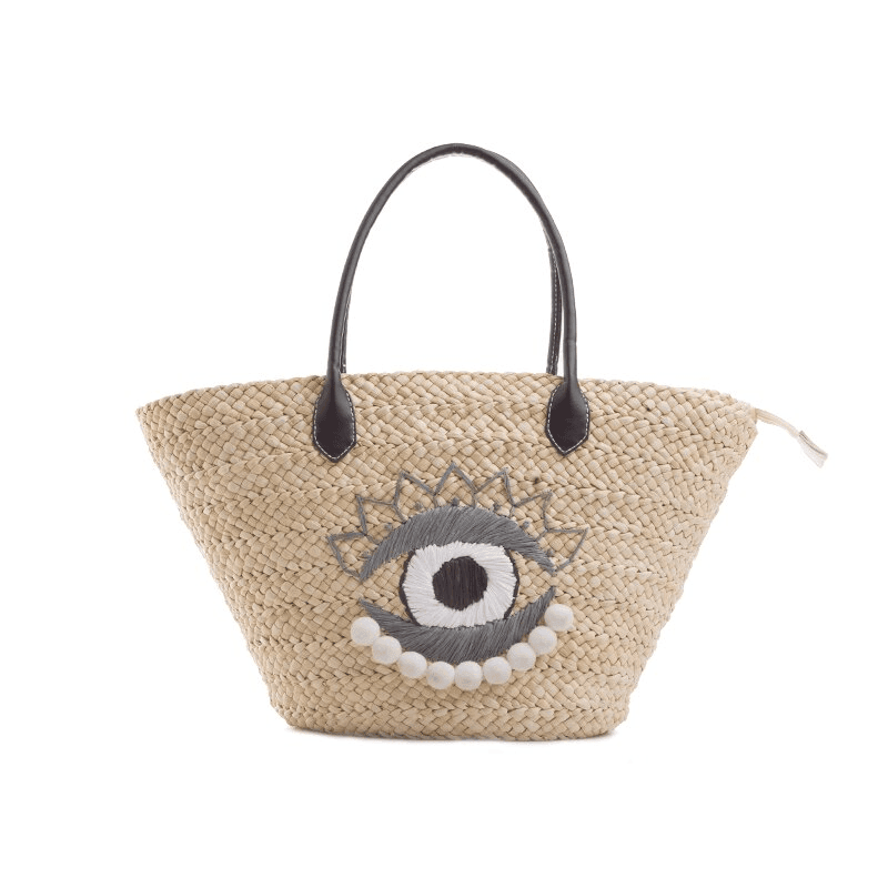 תיק קש של מעצב ישראלי נגד 'עין הרע' להופעה של אישה שמפגינה תעוזה עוצמתית - לה איסלה