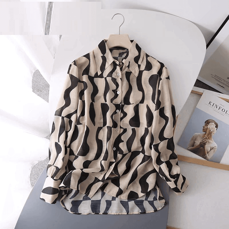 חולצת נשים של מעצב בסיגנון מכופתר למראה מתוחכם ולא מתאמץ ללוק נשי מרהיב - לה איסלה