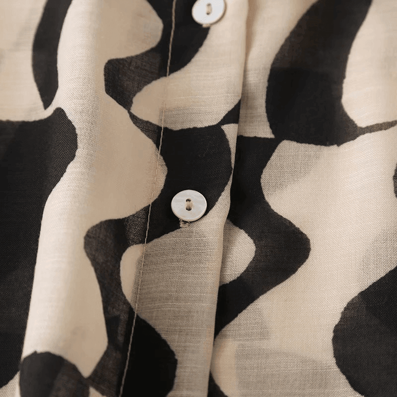 חולצת נשים של מעצב בסיגנון מכופתר למראה מתוחכם ולא מתאמץ ללוק נשי מרהיב - לה איסלה