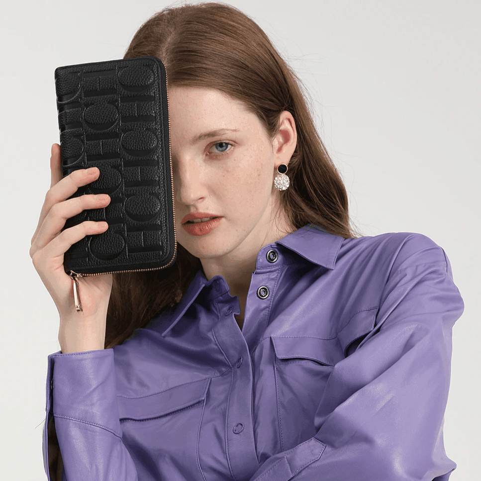 ארנק עור מקורי בחלוקה נבונה של תאים להופעה נשית מרשימה וללוק מקורי - לה איסלה