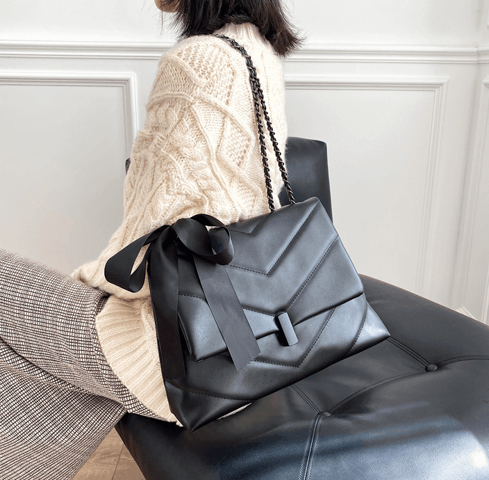 תיק איטלקי בשילוב פפיון סטאן ללוק יוקרתי משגע להופעה של אישה עוצמתית - לה איסלה