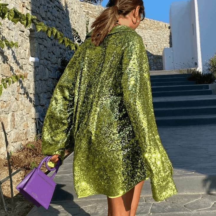 טוניקה נשפכת בגיזרה ארוכה ונוצצת להופעה נשית מרשימה וללוק שמדגיש נוכחות - לה איסלה 